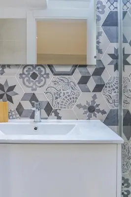 a bathroom with a sink and a mirror at Le Duplex in Villefranche-sur-Mer