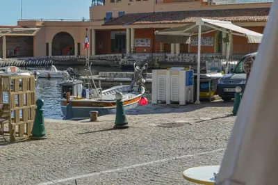 a boat is docked at a marina at Le Duplex in Villefranche-sur-Mer