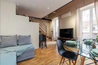 a living room with a glass table and a couch at Duplex center of Nice with AC in Nice