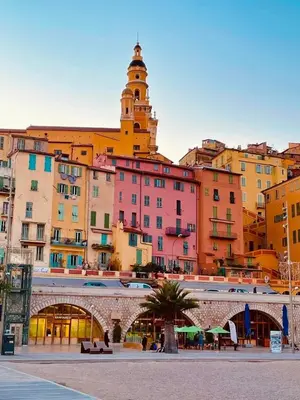 a group of buildings in a city with a clock tower at Nice modern flat in Nice