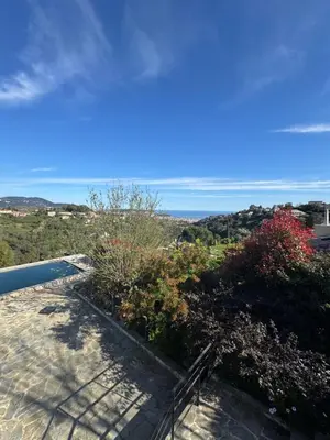 a view of the ocean from the roof of a house at Villa location saisonniere in Nice
