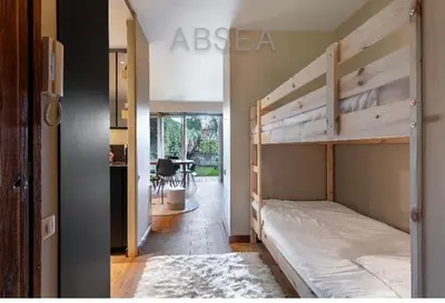 a bedroom with a bunk bed and a desk at Nice Absea Belles Terres Studio in Nice
