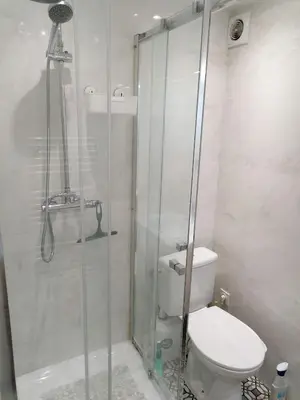 a bathroom with a toilet and a glass shower at Joli studio à Nice in Nice