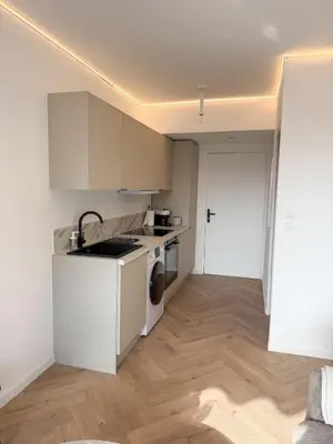 a white kitchen with a sink and a dishwasher at Port de Nice, Appartement 4pers emplacement idéal tout équipé balcon in Nice