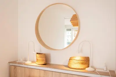 a bathroom with a mirror on a wooden shelf at #26 Idealy located flat AC 2mins walk to Sea balcony in Nice