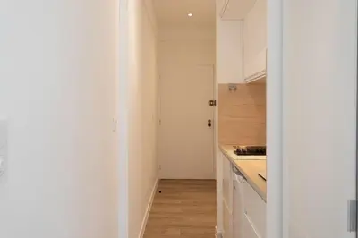 a kitchen with white cabinets and a counter top at #26 Idealy located flat AC 2mins walk to Sea balcony in Nice