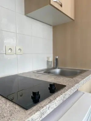 a kitchen with a sink and a counter top at Perfect Studio Nice Beach Airport in Nice