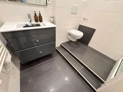 a bathroom with a sink and a toilet at Hype-Center Balcony 3BR AC Near Tram for6 guests in Nice