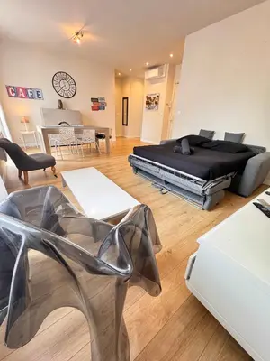 a bedroom with a bed and a living room at Hype-Center Balcony 3BR AC Near Tram for6 guests in Nice