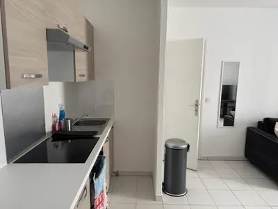a kitchen with a sink and a counter top at Bel appartement au calme hyper centre Nice in Nice