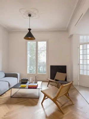 a living room with a couch and a table at Nice Cote d'Azur jardin parking 6 pers luxe in Nice