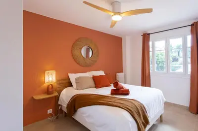 a bedroom with a bed and a ceiling fan at #41 Flat for 6, 3 Bdrs Parking Wifi 5mins walk Tram T1 in Nice