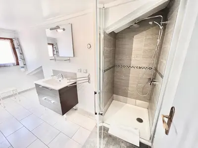 a bathroom with a shower and a sink at E OP Duplex d Antoine Old Port - Old Town in Nice