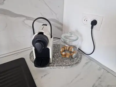 a blender on a counter next to a jar of doughnuts at Chez Stella - Proche Mer in Nice