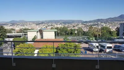 a view of a parking lot with a city at Entire Condo in Nice in Nice