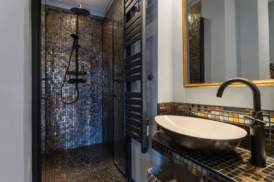 a bathroom with a sink and a shower at LE ROYAL AP4456 by Riviera Holiday Homes in Nice