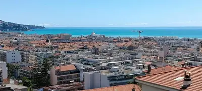 an aerial view of a city with the ocean at Appartement vue mer et panoramique, 2 chambres, 3 lits in Nice