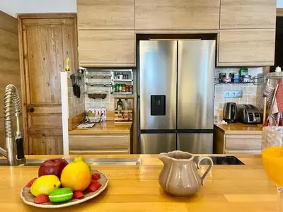 a kitchen with a plate of fruit on a counter at Le Splendide in Nice