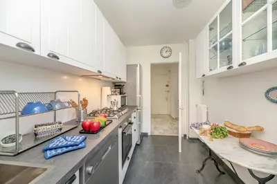 a kitchen with a counter with fruits and vegetables on it at La Casa Azzura in Nice