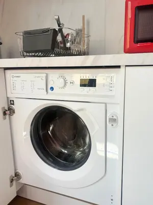 a white washing machine with a basket on top of it at Centre ville-vieille ville-promenade des Anglais in Nice