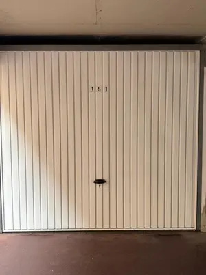 a garage door with the number on it at Spacieux 4P familial renové in Nice