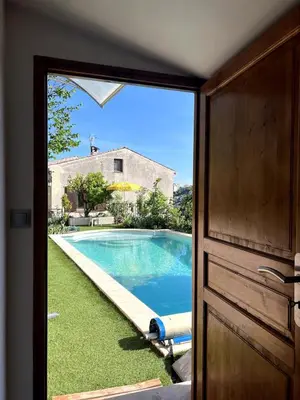 a view of a swimming pool through a door at Cabana 12 m2 in Nice