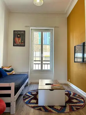 a group of chairs and a table on a patio at Charming Flat in Nice Villa in Nice