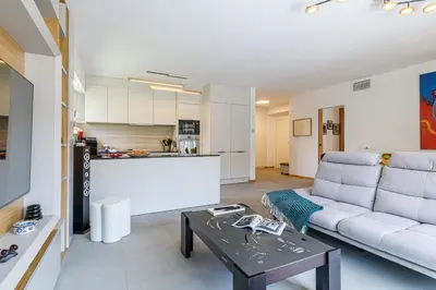 a living room with a couch and a table at MY CASA - GAIRAUT - 5 rooms - Terrasse in Nice
