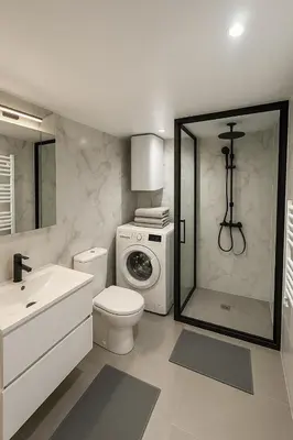 a bathroom with a toilet and a washing machine at Sea Side, Modern, Nice Promenade in Nice