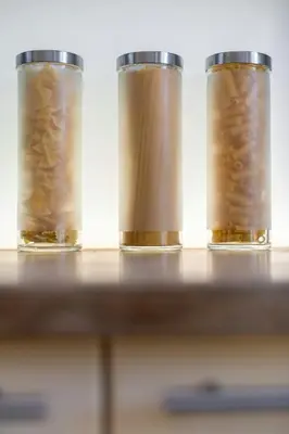 three glass jars sitting on top of a table at Sea View Villa In The Hills Of Nice in Nice