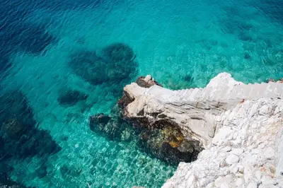 an aerial view of the clear blue water at Cap de Nice in Nice