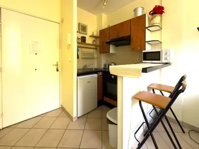 a small kitchen with a sink and a counter at Depoilly 3 Pers Centrale WiFi in Nice