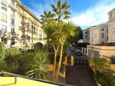 a view of a city with palm trees and buildings at Depoilly 3 Pers Centrale WiFi in Nice