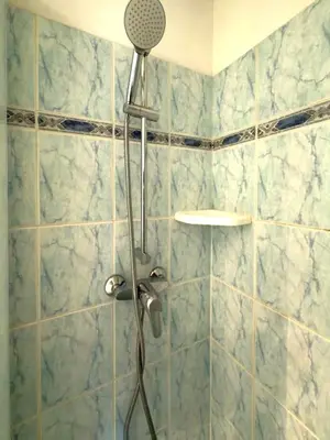 a shower with a blow dryer in a bathroom at Depoilly 3 Pers Centrale WiFi in Nice