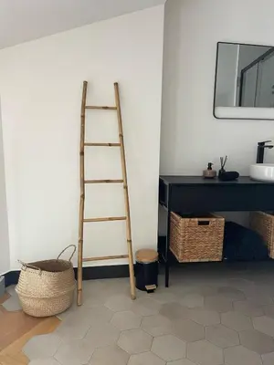 a ladder leaning against a wall next to a desk at Duplex Place Garibaldi - Close to port, Old Nice in Nice
