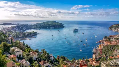 a view of a bay with boats in the water at Cosy Studio Sea view in Villefranche-sur-Mer