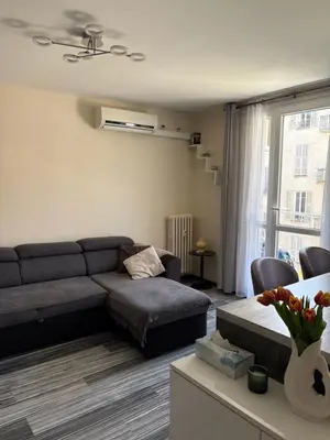 a living room with a couch and a window at Elegant Apartment Terrace Port of Nice in Nice