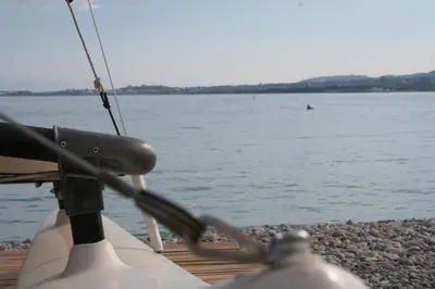 a view of the water from the back of a boat at Rez de jardin en bord de mer in Cagnes-sur-Mer