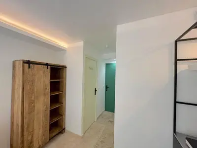an empty room with a closet and a door at ⁂ Studio Vieux-Nice climatisé: charme commodités in Nice