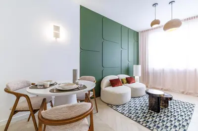 a living room with a table and chairs at BERLIOZ - Splendid apartment in Nice city center in Nice
