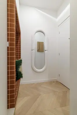a bathroom with a urinal in a white wall at BERLIOZ - Splendid apartment in Nice city center in Nice