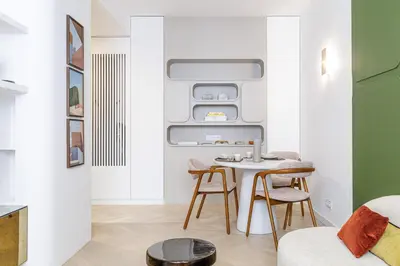 a small dining room with a table and chairs at BERLIOZ - Splendid apartment in Nice city center in Nice