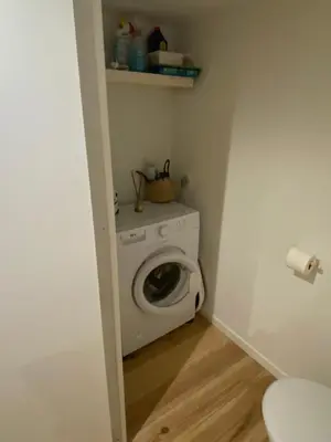 a washer and dryer in a small room at Chez Valentine in Nice