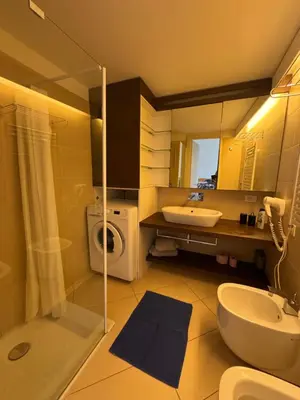 a bathroom with a sink and a toilet and a shower at Apartment duplex in Eze sur Mer in Èze