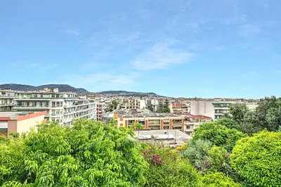 a view of a city with trees and buildings at Modern Apartment With City View - Happy Rentals in Nice