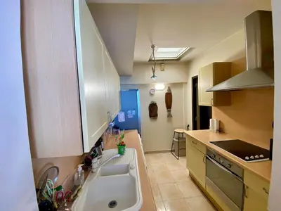 a kitchen with a sink in the middle of it at NICE 2P Panoramic Sea View Wi-Fi AC in Nice
