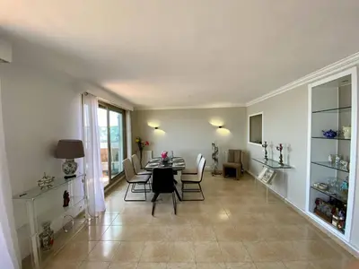 a dining room with a table and chairs at NICE 2P Panoramic Sea View Wi-Fi AC in Nice