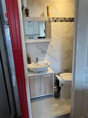 a bathroom with a sink and a toilet at Daghsen in Nice