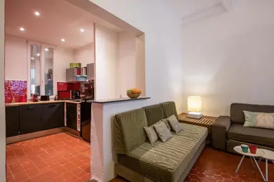 a living room with a couch and a kitchen at 