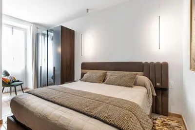 a bedroom with a large bed in a room at Appartement 2 chambres proche plage climatisé in Nice